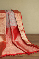Kani Red and gold saree with intricate patterns