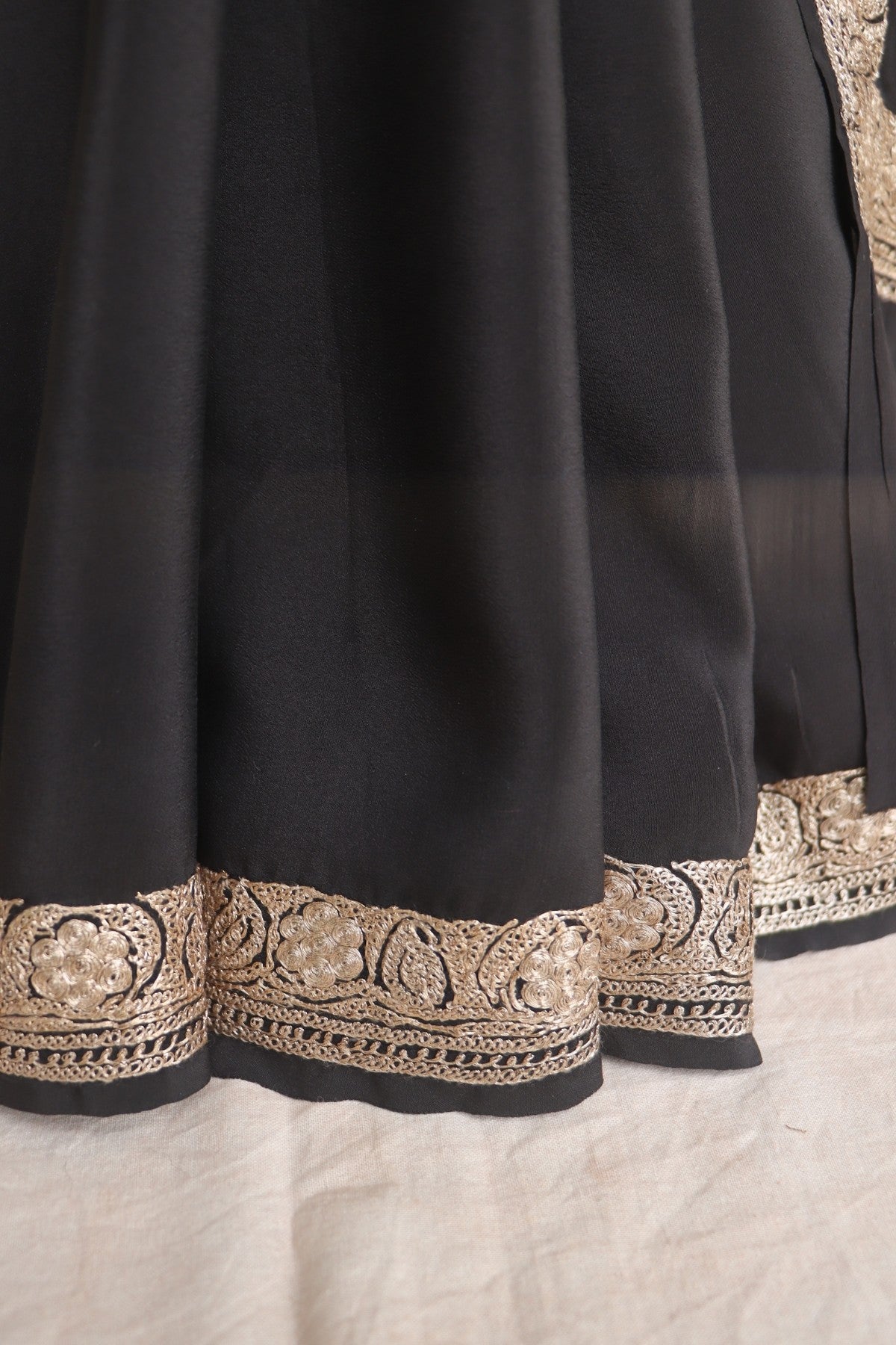 Black saree with gold metallic embroidery 