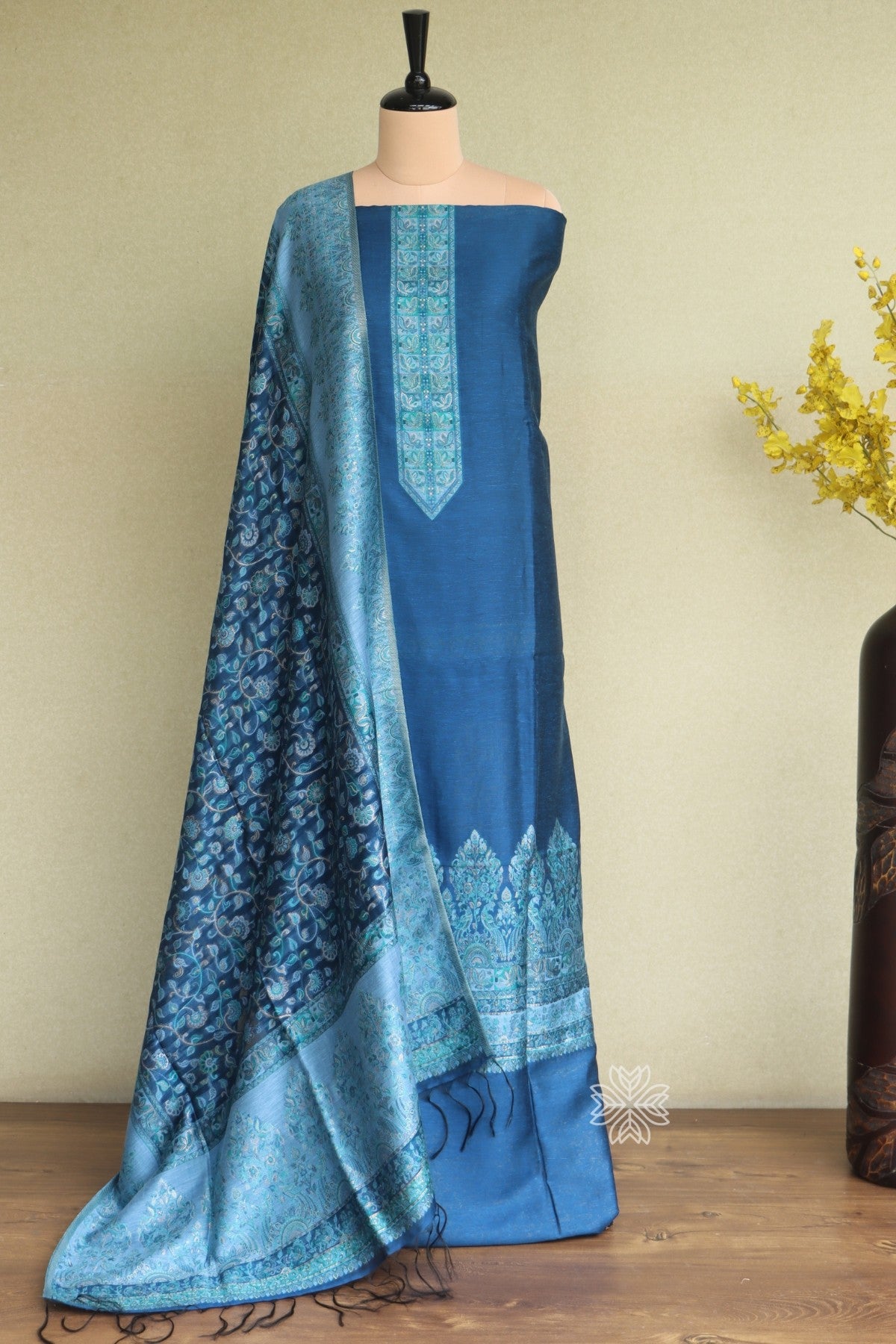 Blue traditional salwar suit with intricate patterns