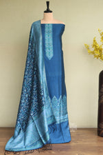 Blue traditional salwar suit with intricate patterns