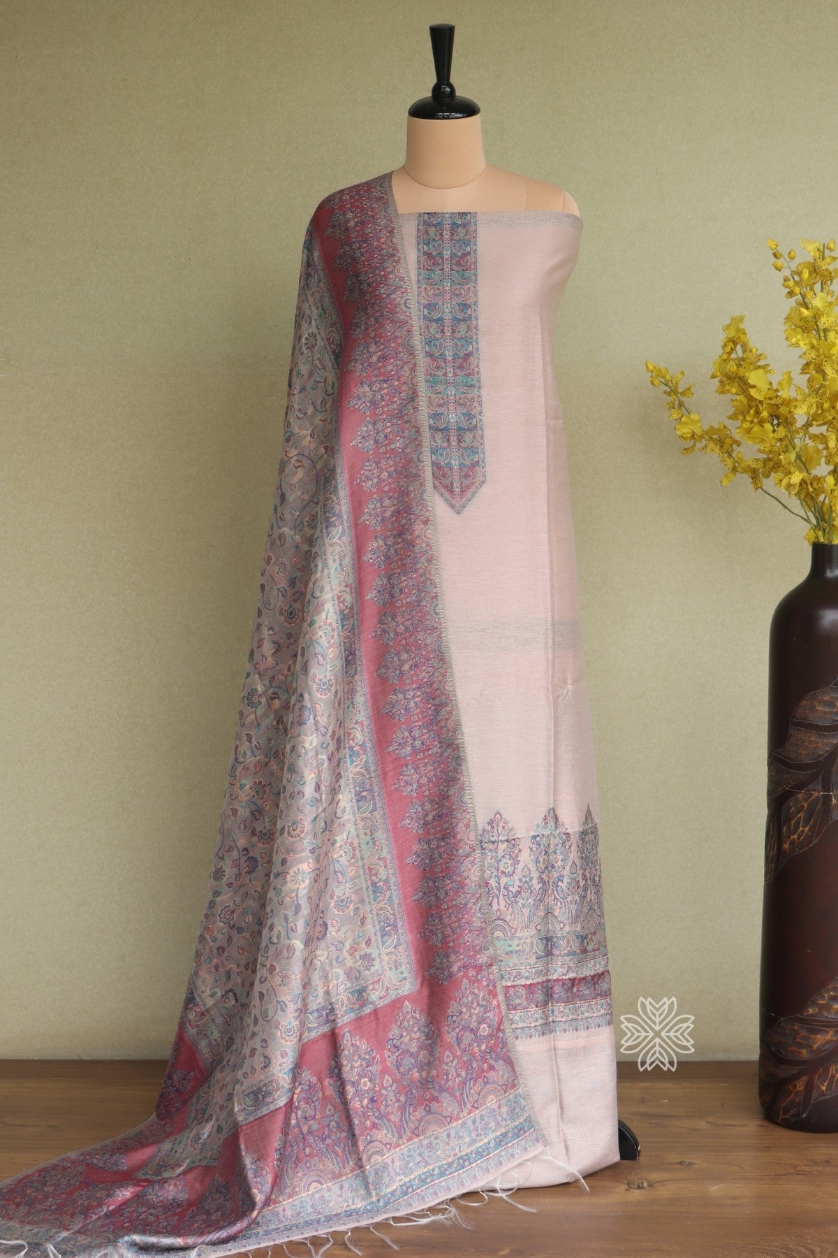  light pink kurta set with a patterned Kashmiri weave dupatta 