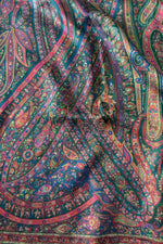 Close-up of colorful paisley patterned fabric Green Kani Jamawar Silk Saree
