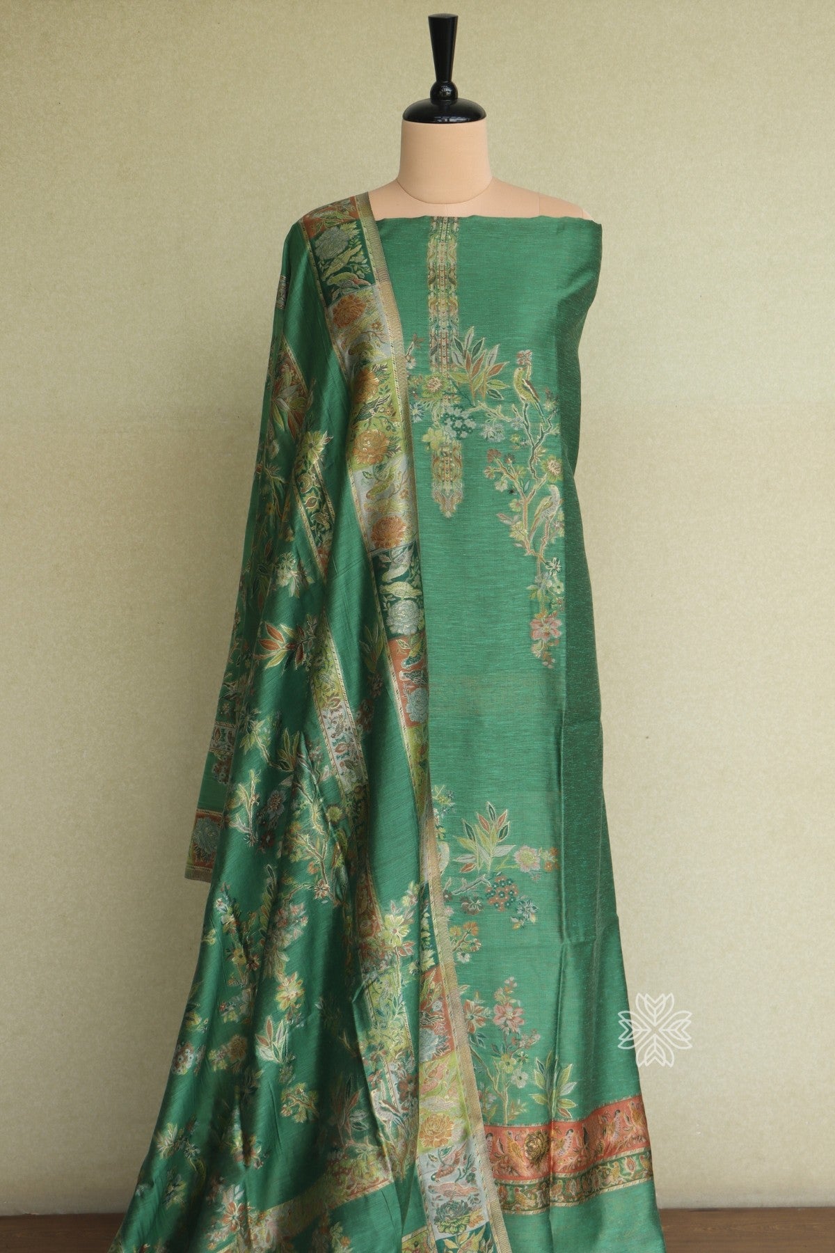 Green traditional Salwar suit with floral patterns 