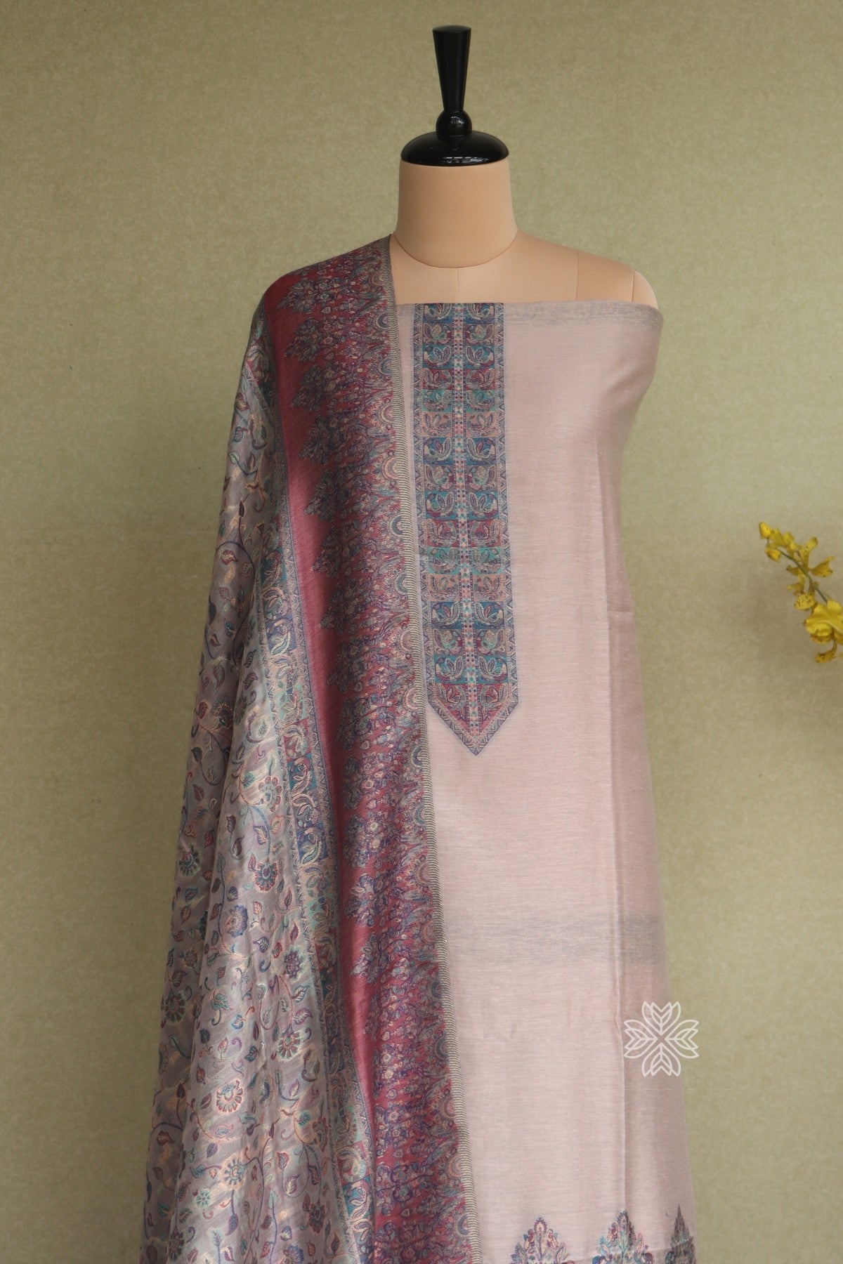 Traditional light pink dress with a patterned shawl dupatta