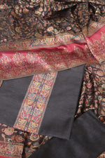 patterned Salwar suit fabric with intricate designs in red, black, and gold